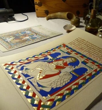 Démonstration d'enluminure, de calligraphie et de tissage