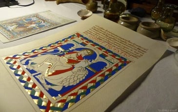 Démonstration d'enluminure, de calligraphie et de tissage